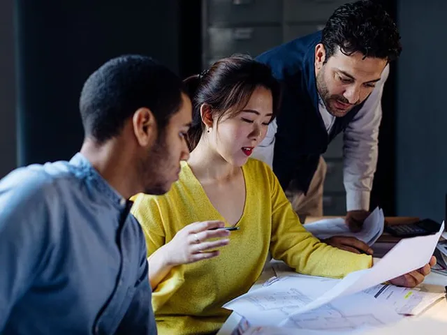 Professionals preparing financial statements for business reporting and compliance