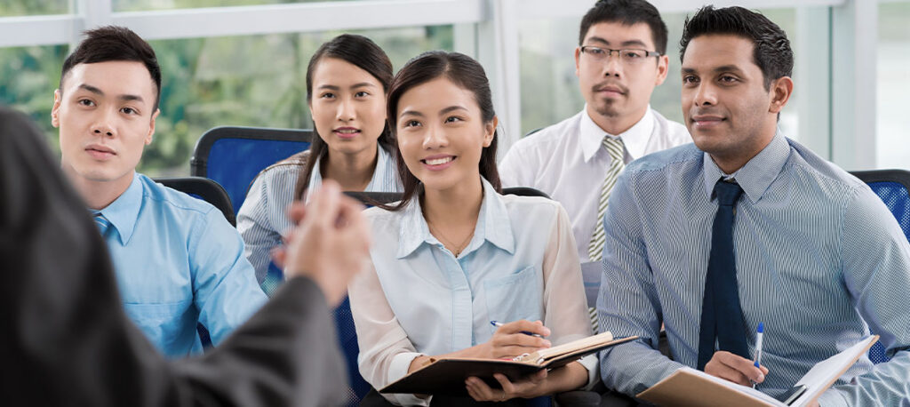 Professionals attending a training and career development session at BSH Group Singapore